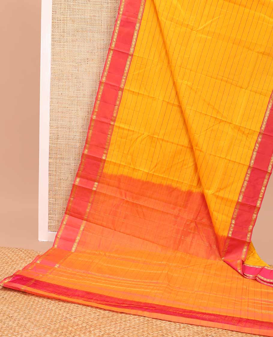 Orange striped kancheepuram silk saree with contrast rettai pettu border of banaras, paun design & zari design pallu