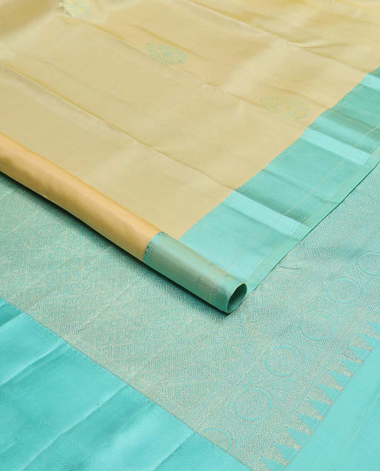 Yellow buttas kancheepuram silk saree with contrast zari design border & argyle design pallu