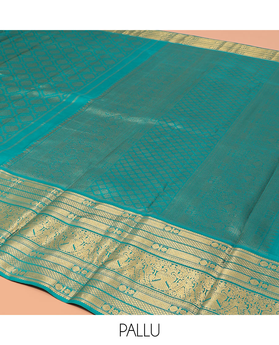 Blue Kanchipuram Wedding Silk Saree, Finely Crafted with Jacquard Design on Its Body, Highlighted by Zari Border of Mayil Kann, Rudraksham, Kamalam, and Iruthalai Pakshi Designs, Intricately Designed Pallu, and Paired with a Matching Blouse