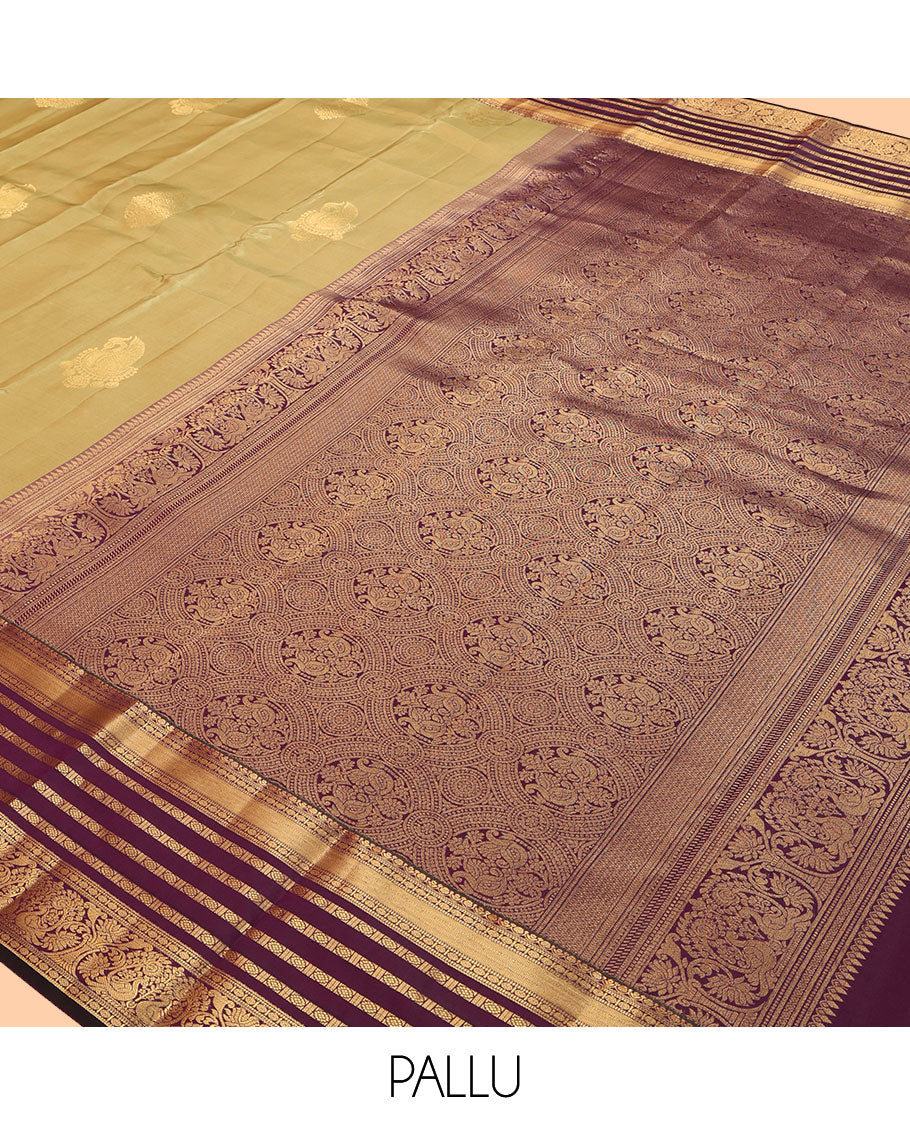 Green Vasundhara Lite Silk Mix Saree, Sparsely Woven with Zari Butats, a Contrast Border of Muthu, Rudraksham, and Mayil Designs, Grand Pallu, and a Contrast Blouse
