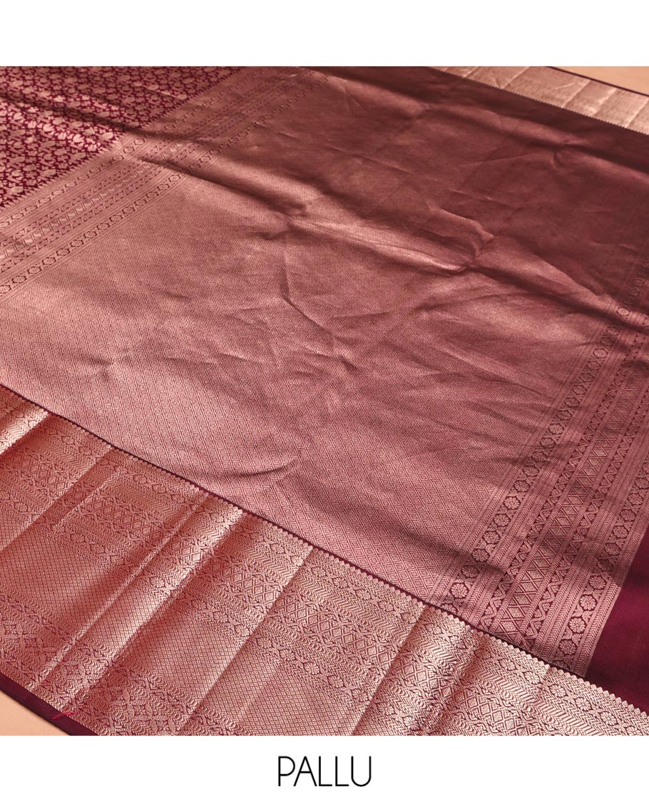 Maroon Kanchipuram Wedding Silk Saree, Elegantly Embellished with Jacquard Design on Its Body, Highlighted by Zari Border of Thilakam Mokku, Kathir, Cross Kamalam, and Mayil Kann Designs, Grand Jaal Pallu, and Paired with a Matching Blouse