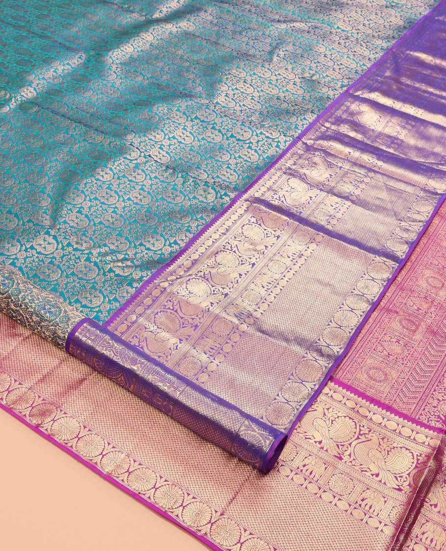 Blue Kanchipuram Wedding Silk Saree, Embellished with Jacquard Design, a Contrast Border of Thilakam, Rudraksham, Mayil, Yaanai, Chakram, and Mayil Kann, Grand Pallu, and a Contrast Blouse