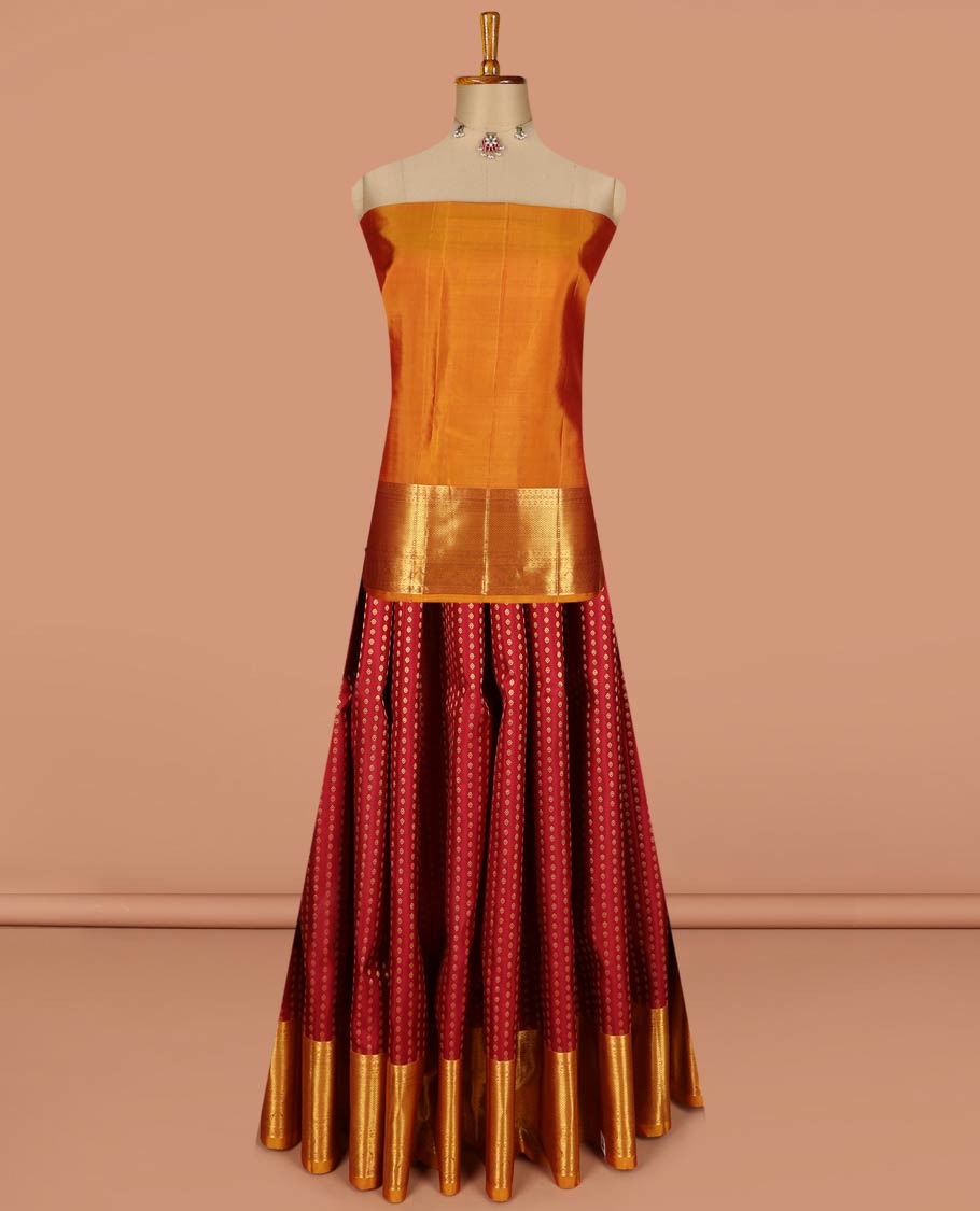 Maroon pure-silk half-saree, zari buttas with contrast traditional zari bordered skirt, zari design blouse, and a mat textured dhavani