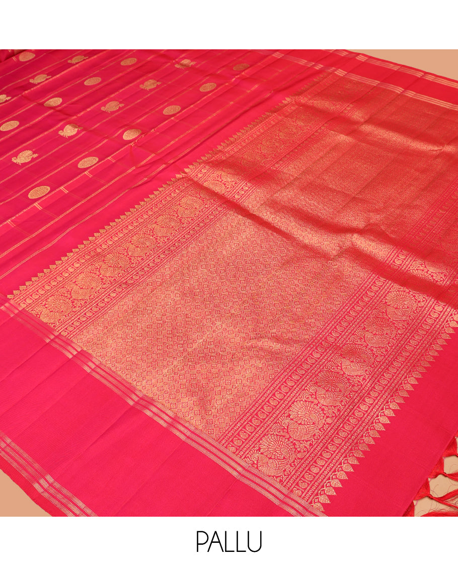 Pink Kanchipuram Silk Saree, Adorned with Mayil-Chakram Butta Enclosed Checks, a Zari Bodi Border, Zari Grand Pallu, and a Matching Blouse