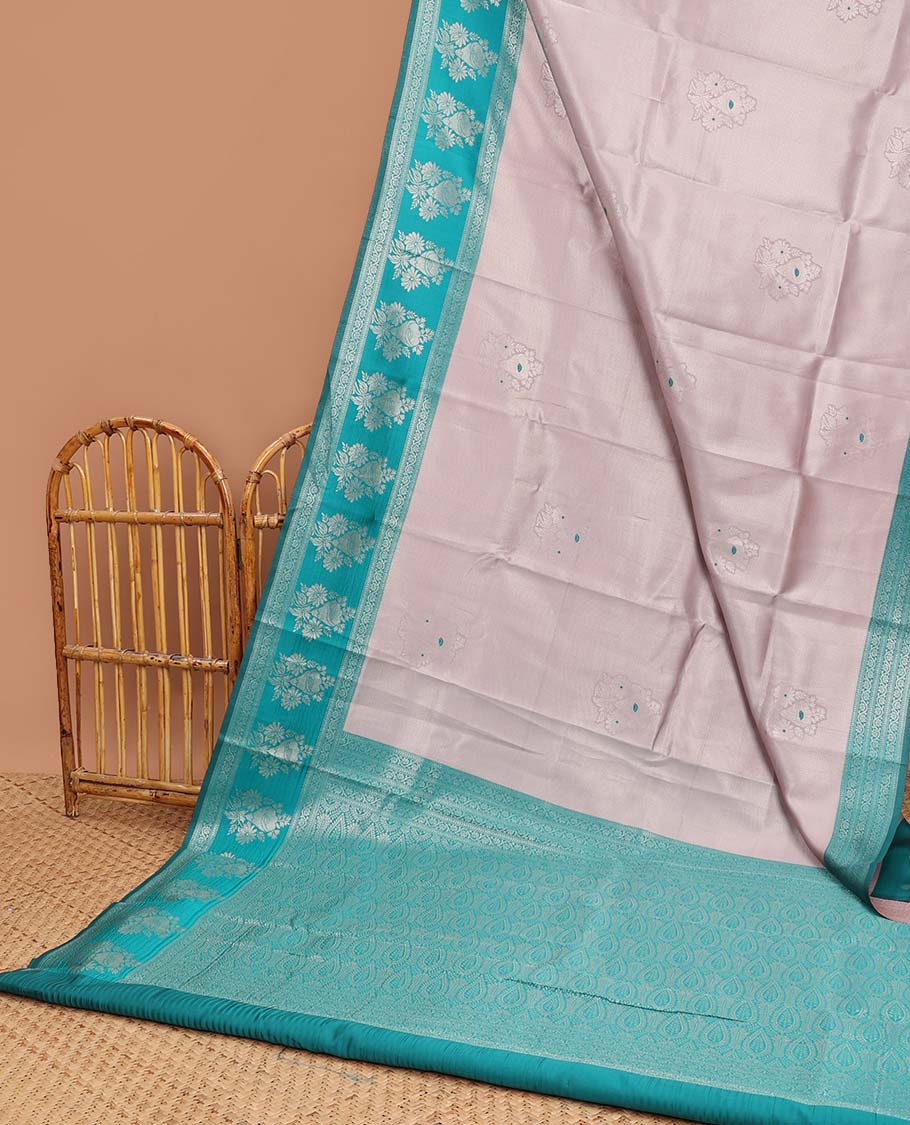 Mauve floral motifs litchi silk saree with contrast floral design border & floral jaal design pallu