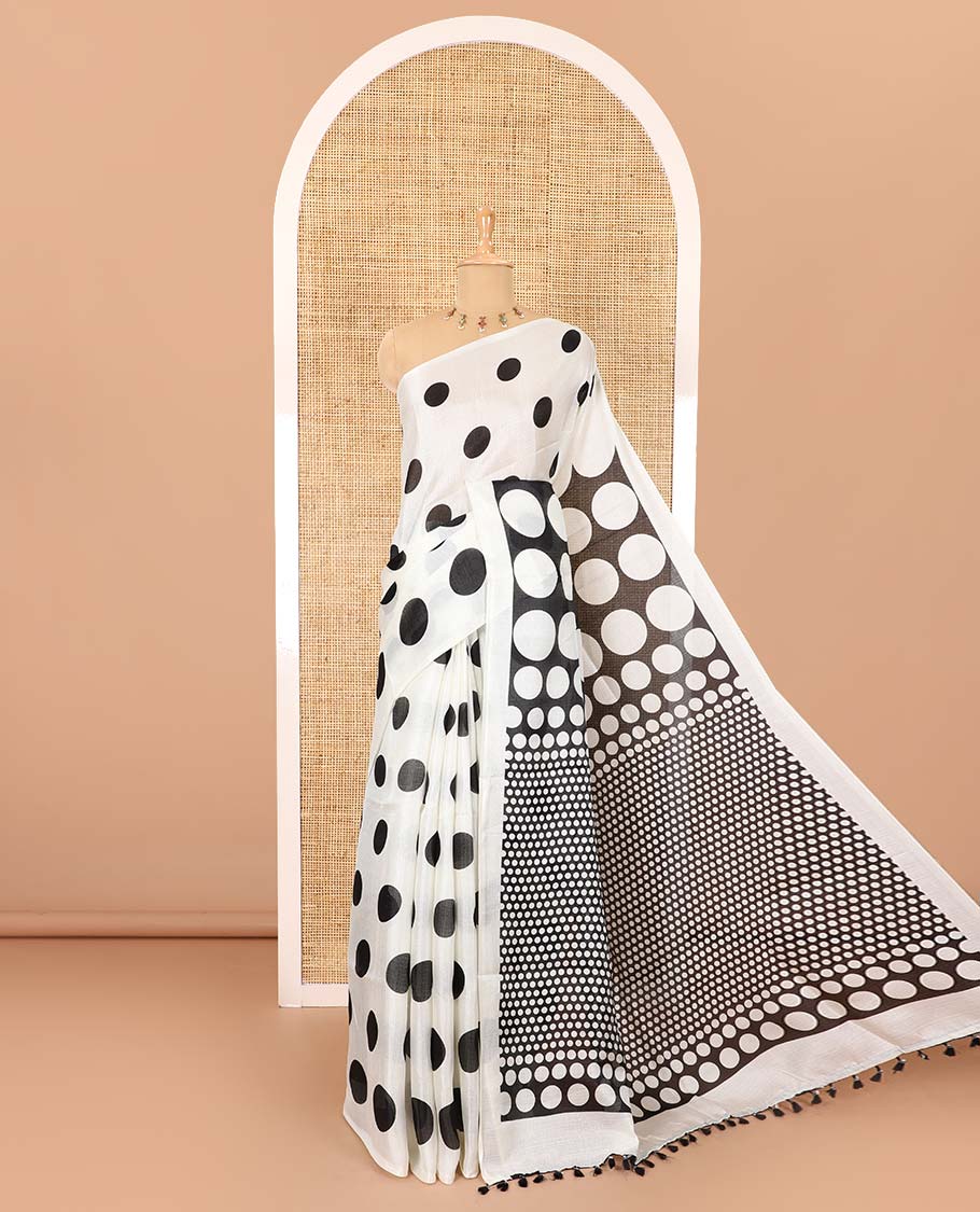 Borderless cream and black polka dots printed art khadi cotton saree, pallu steeped with polka dots, and a contrast tiny polka dots printed blouse