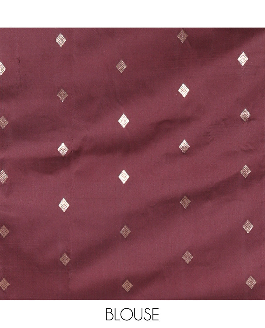 Brown Kanchi Soft Silk Saree, Artfully Woven with Peacock Zari Buttas All Over Its Body, Highlighted by Traditional Zari Design Border, Grand Jaal Pallu, and Paired with a Matching Blouse