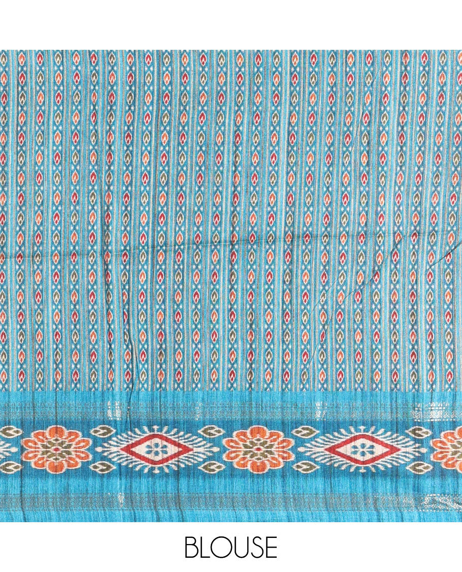 Chikku- blue plain Katan silk saree, contrast ikkat floral-geometric printed temple border, ikkat printed pallu, and ikkat printed blouse