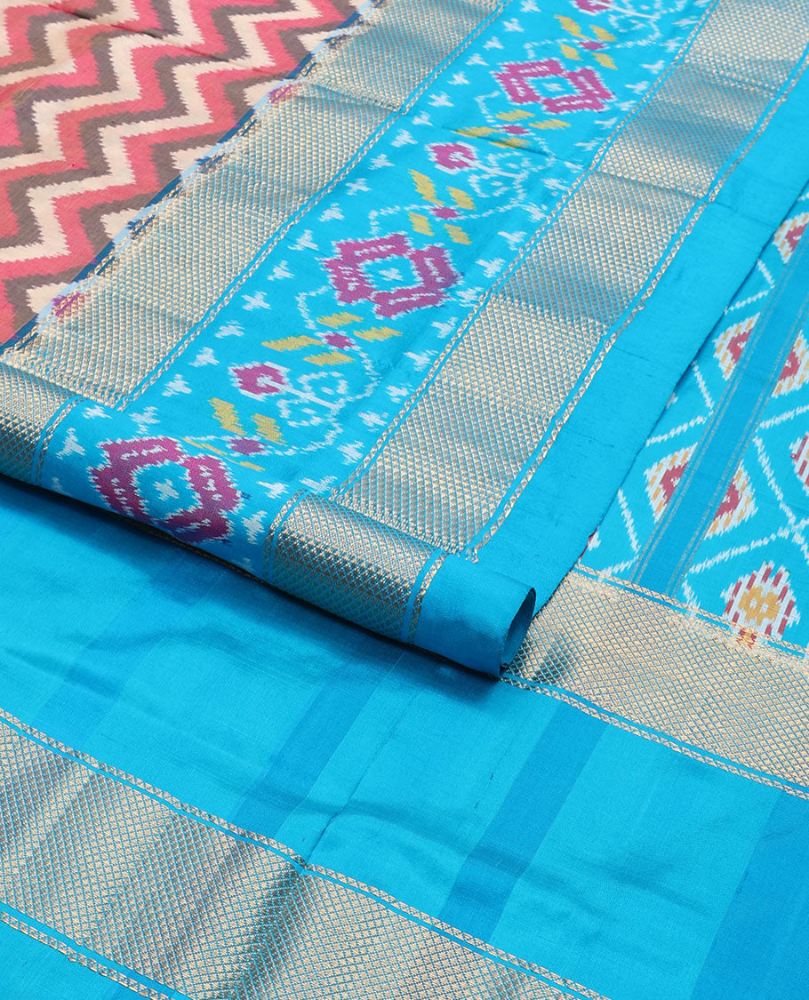 Multi- color chevron design ikkat sareee with contrast zari, floral design border & floral enclosed with checked design pallu