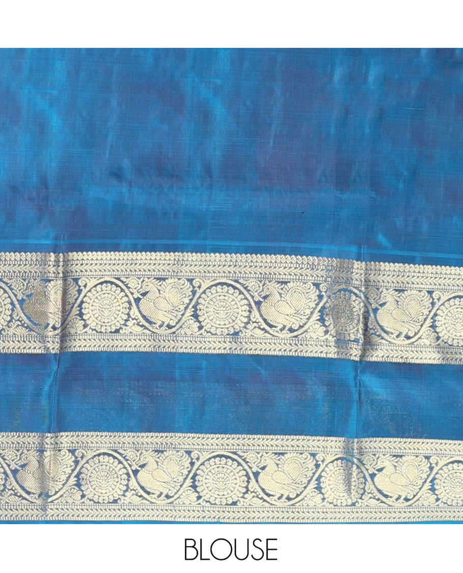 Pink Venkatagiri Silk Saree, Enlivened with Zari Buttas Enclosed Checks All Over Its Body, Complemented by a Contrast Traditional Zari Design Border of Peacock-Chakram Designs, Traditional Design Pallu, and Paired with a Contrast Blouse