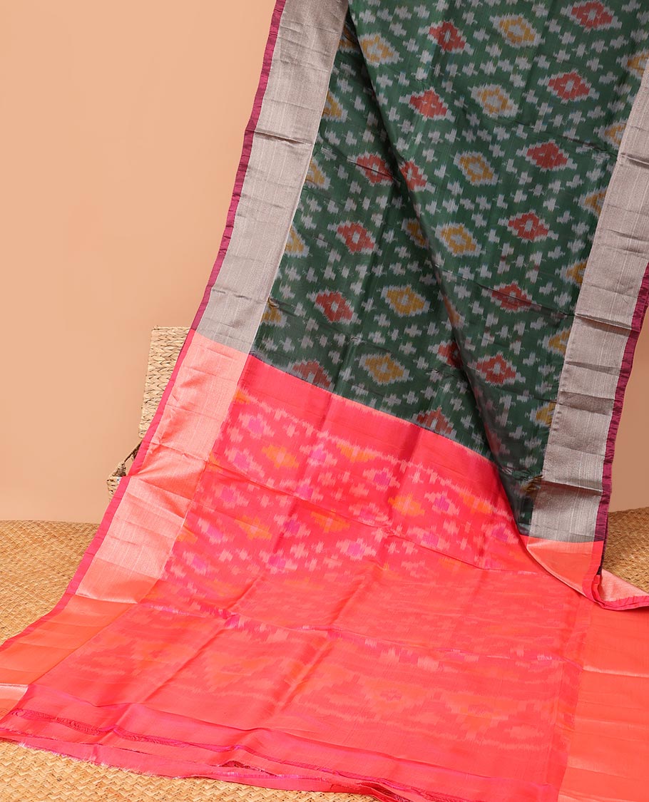 Light Green ikkat argyle semi-uppada saree with contrast zari border & intricate ikkat design pallu
