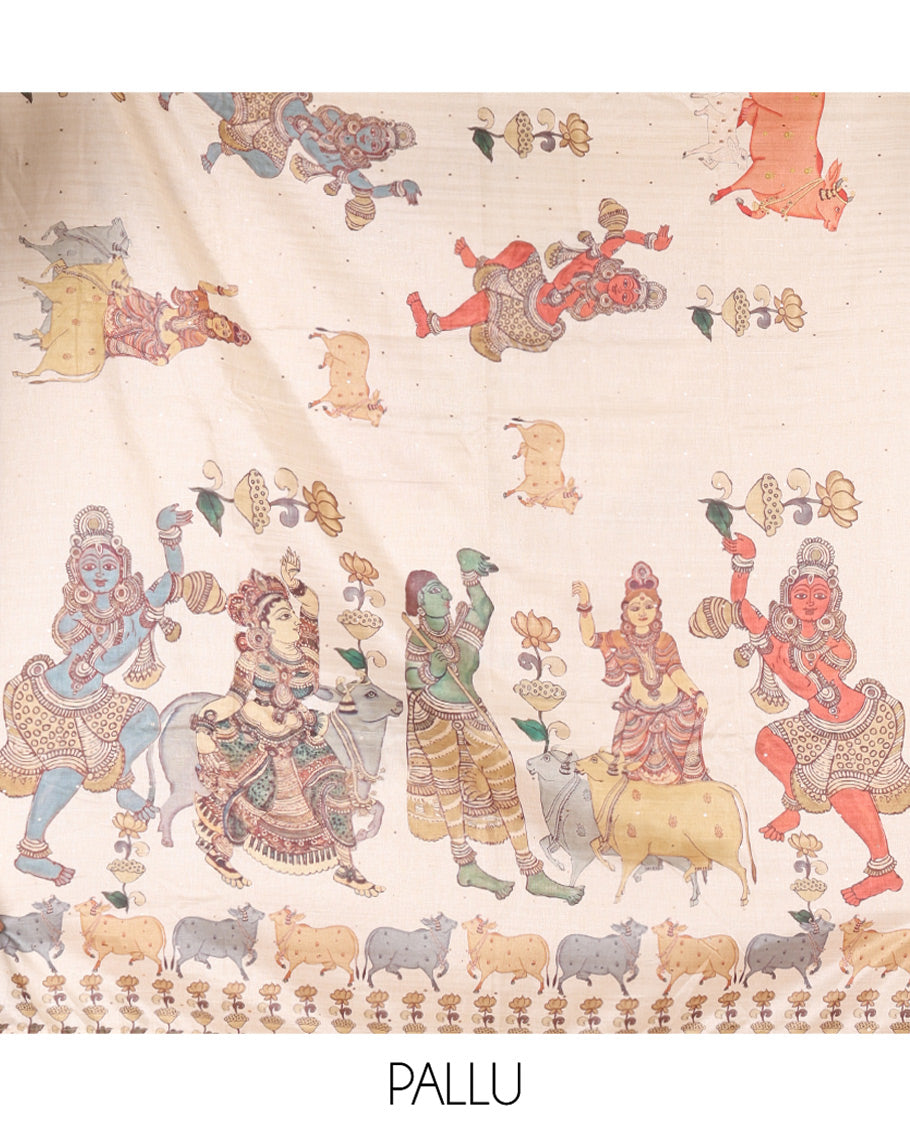 Borderless Cream Semi-Tussar Saree, Artfully Printed with Ancient Human Figurines, Floral, and Pichwai Cow on Its Body, Highlighted by Kalamkari-Style Human Motifs Printed Pallu, and Paired with a Matching Pichwai Cow Printed Blouse