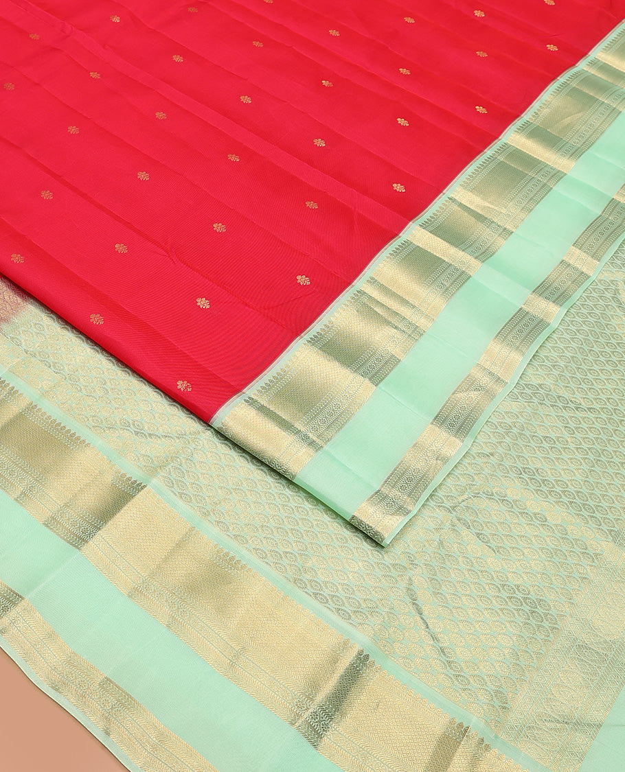 Red zari buttas Vasundhara silk mix saree, contrast border of thilakam, kathir, mayil kann, kathir, kamalam, and banaras, and peacock feather motifs pallu