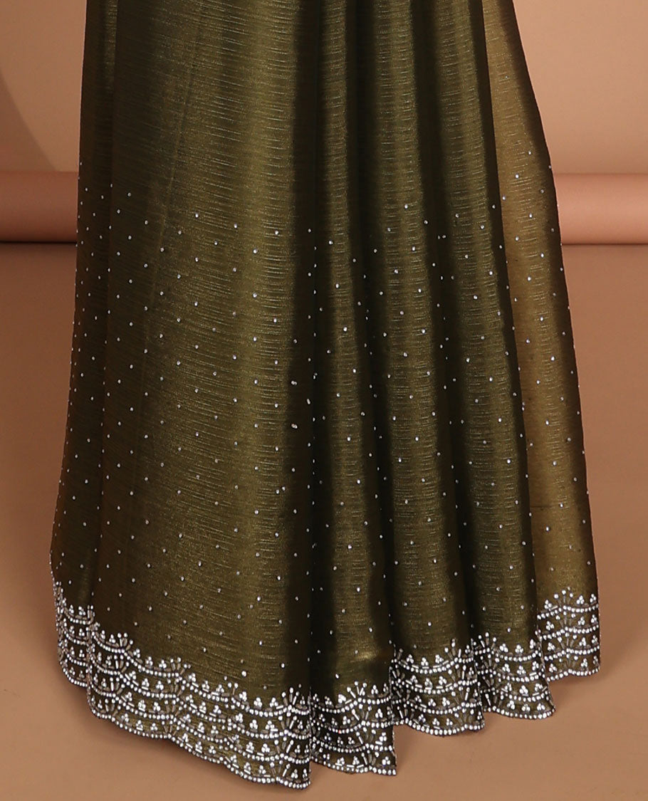 Green all-over stone work burburry chiffion saree with self cutthana stone work border