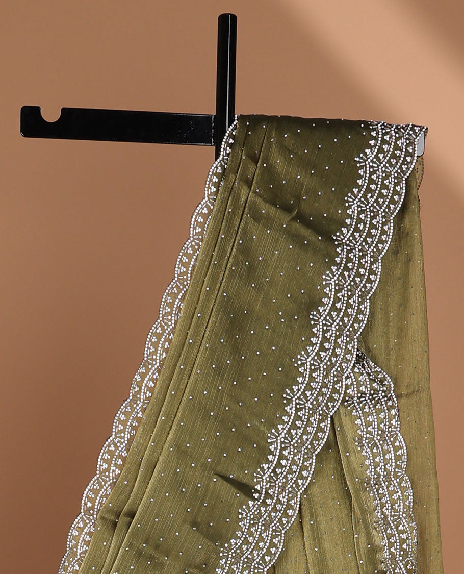 Green all-over stone work burburry chiffion saree with self cutthana stone work border