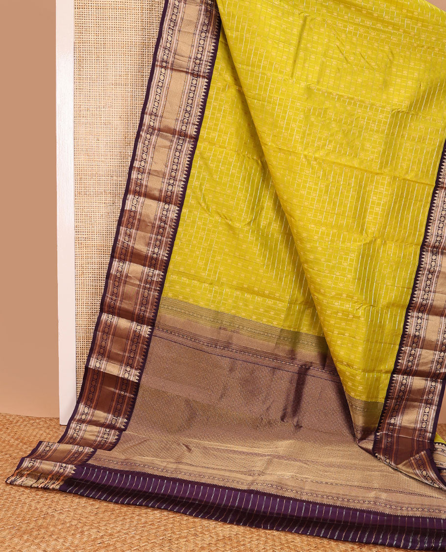 Green checked. buttas silk saree with contrast intricate zari design border & jaal design pallu