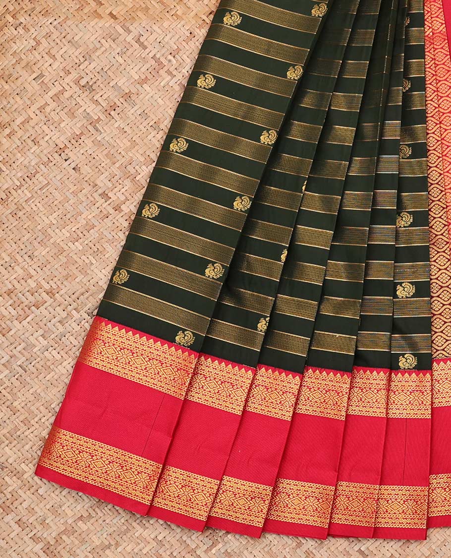 Green Budget Silk Saree, Artfully Woven with Zari Stripes and Peacock Buttas All Over Its Body, Complemented by Contrast Rettai Pettu Border of Traditional Zari Designs, Grand Jaal Pallu and Paired with a Contrast Blouse