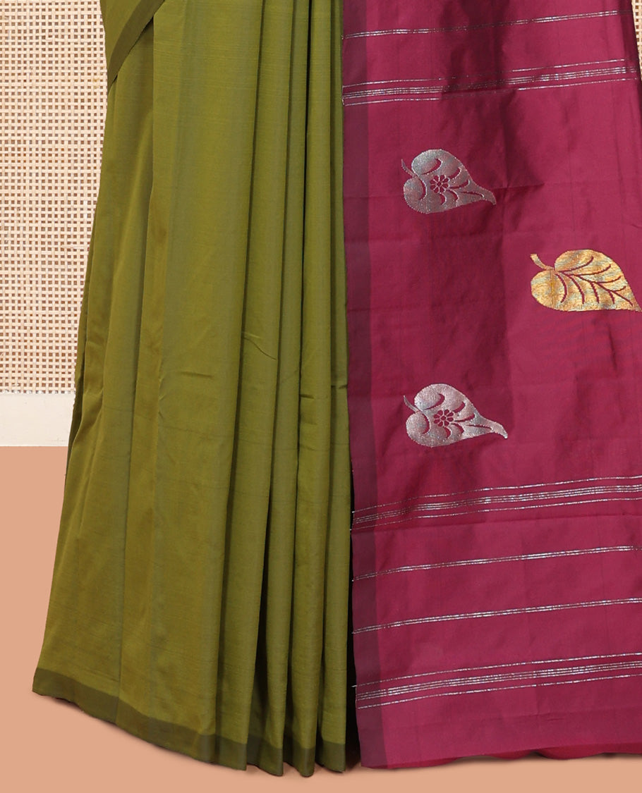 Borderless Green Leaf Buttas Arani Saree, a Contrast Pallu of Zari Stripes and Buttas, and a Contrast Blouse
