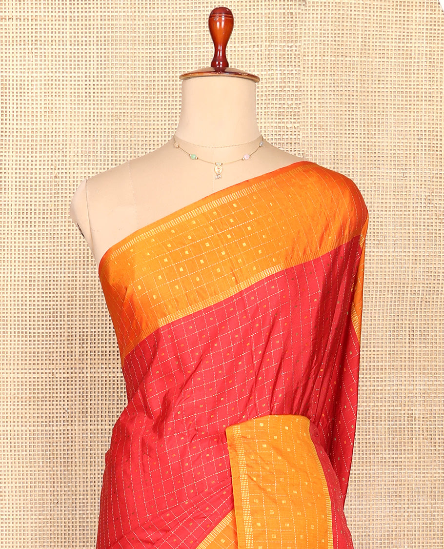 Red Aarani Silk Saree, Elevated with Butta Enclosed Checks, Complemented by a Contrast Butta Enclosed Checked Border, Zari Design Pallu, and Paired with a Matching Blouse