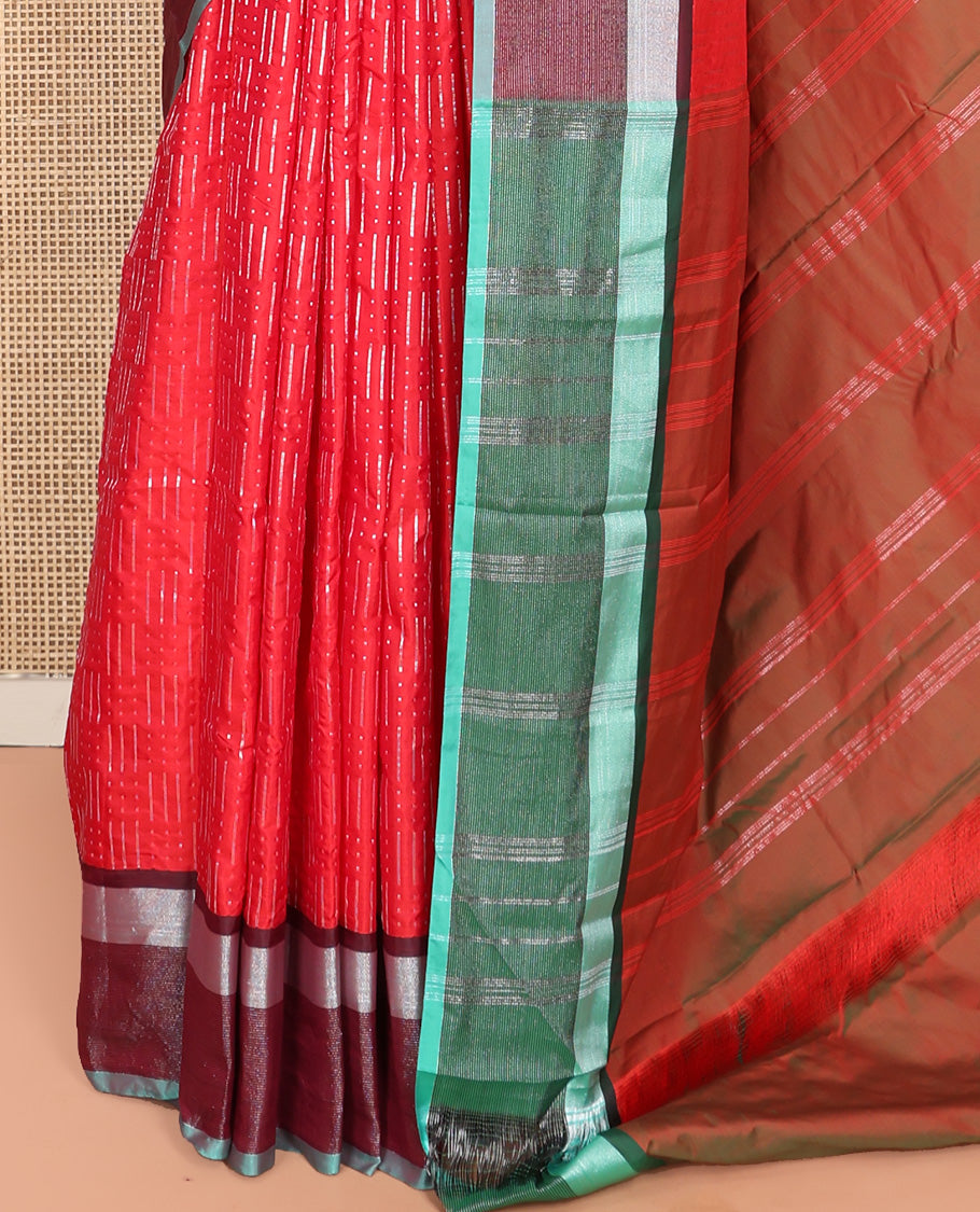 Red Aarani Silk Saree, Steeped in Richness of Zari Buttas All Over Its Body, Complemented by a Contrast Border, Pallu of Stripes, and Paired with a Contrast Blouse