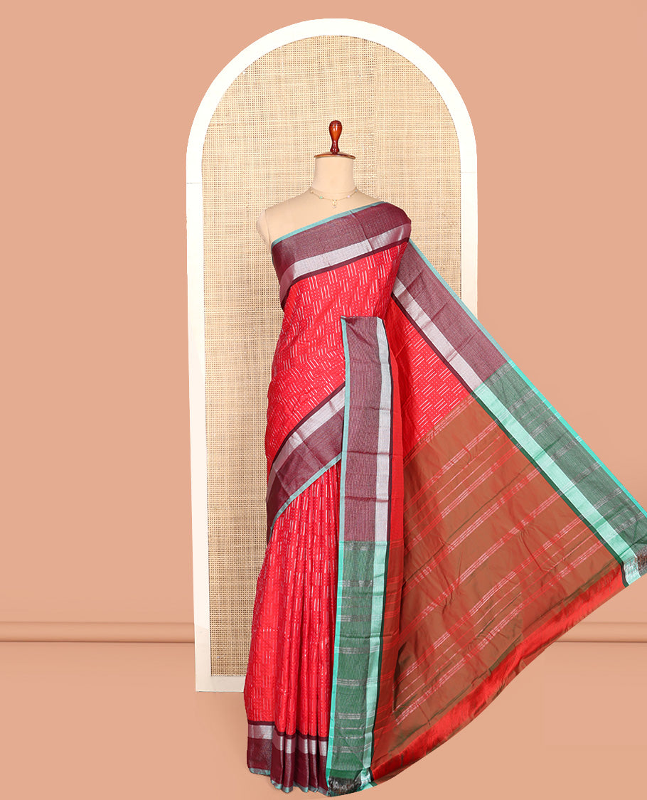 Red Aarani Silk Saree, Steeped in Richness of Zari Buttas All Over Its Body, Complemented by a Contrast Border, Pallu of Stripes, and Paired with a Contrast Blouse