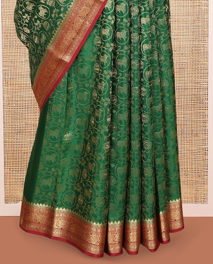 Green Mysore Silk Saree, Embellished with Lotus Vine and Pichwai Cow Designs, Complemented by a Contrast Traditional Zari Border, Grand Pallu, and a Contrast Blouse