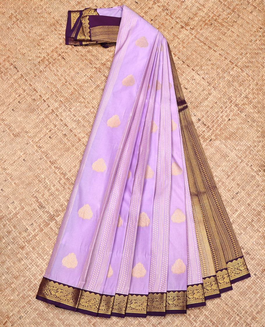 Lavender Budget Silk Saree, Gracefully Embellished with Zari Designs All Over Its Body, Complemented by a Contrast Traditional Zari Design Border, Geometric Patterned Pallu, and Paired with a Contrast Blouse