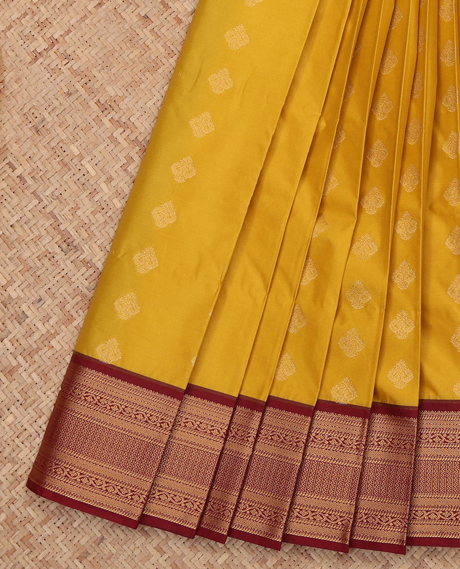 Yellow Budget Silk Saree Featuring Zari Buttas, a Contrast Traditional Zari Border, Jaal Pallu, and a Contrast Blouse