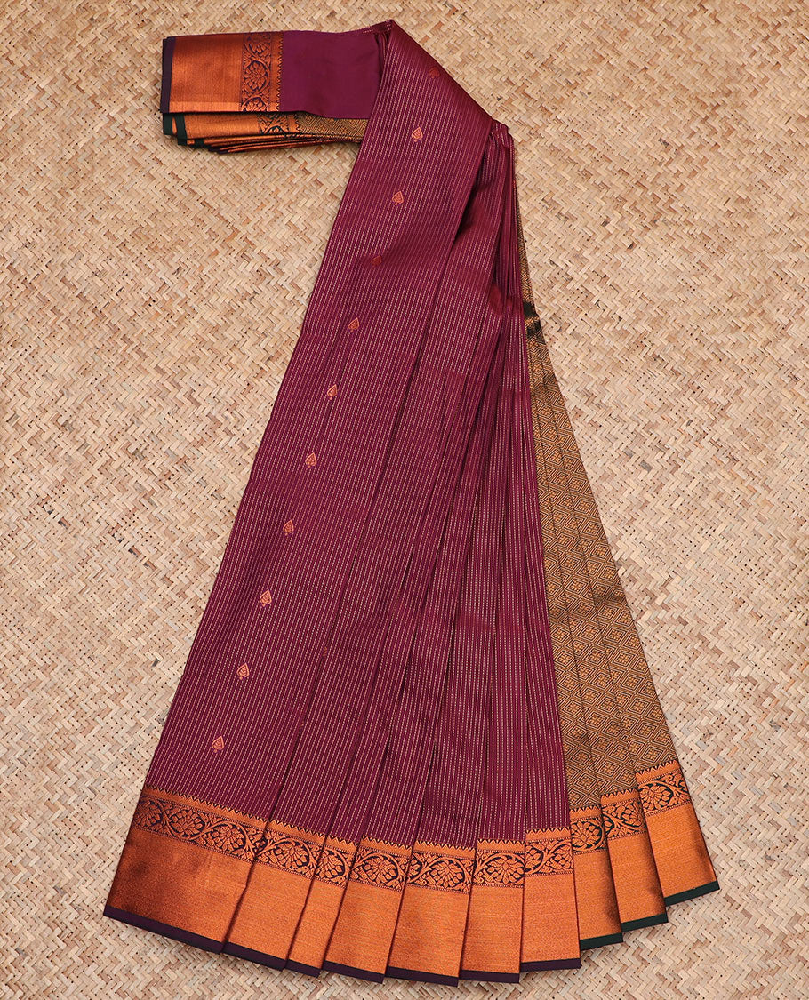 Maroon Budget Silk Saree Adorned with Dotted Zari Stripes and Zari Buttas, Complemented by a Contrasting Temple Floral Creeper Design Zari Border, Intricately Woven Jaal Pallu, and a Contrasting Zari-Bordered Blouse