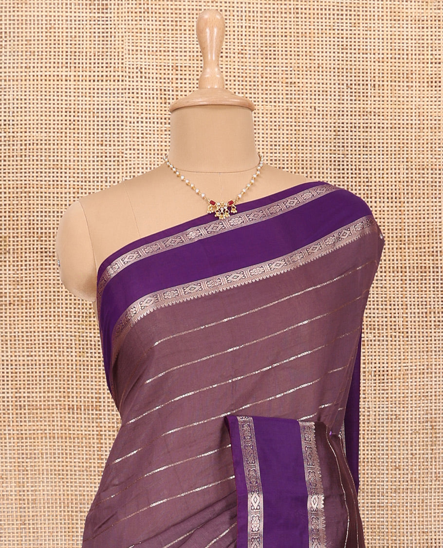 Brown Assam Silk Saree Embellished with Zari Stripes, Complemented with a Contrast Traditional Design Border, Zari-Elevated Pallu, and Paired with a Contrast Blouse