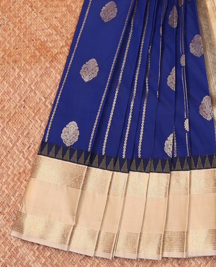 Blue Budget Silk Saree, Bedecked with Zari Buttas and Zari Stripes On Its Body, Complemented by Temple Rettai Pettu Traditional Zari Designs Woven Border, Grand Mughal-style Intricately Woven Pallu, and Paired with a Contrast Blouse