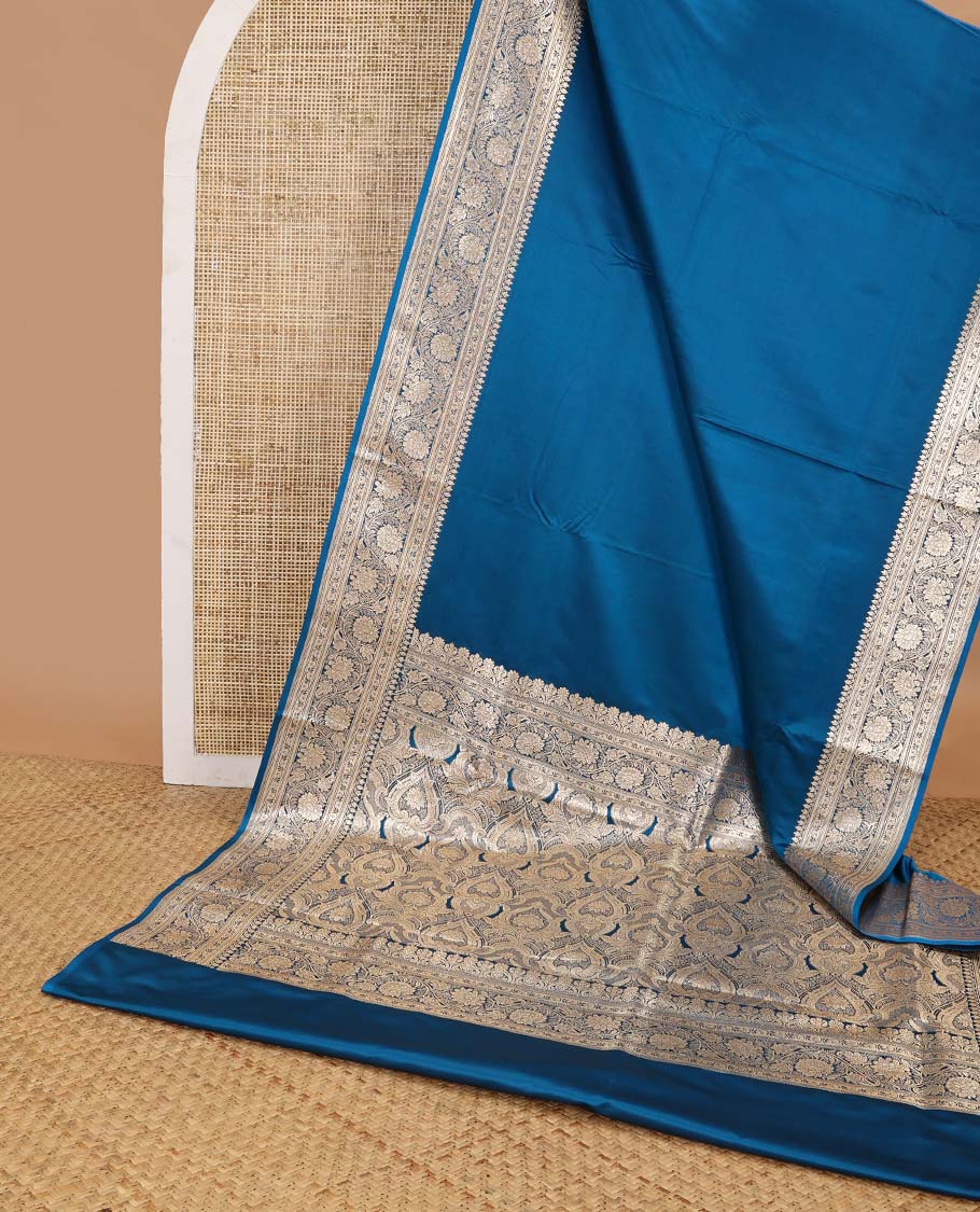 Blue semi banaras nylon saree with self floral design border & floral ogee design pallu