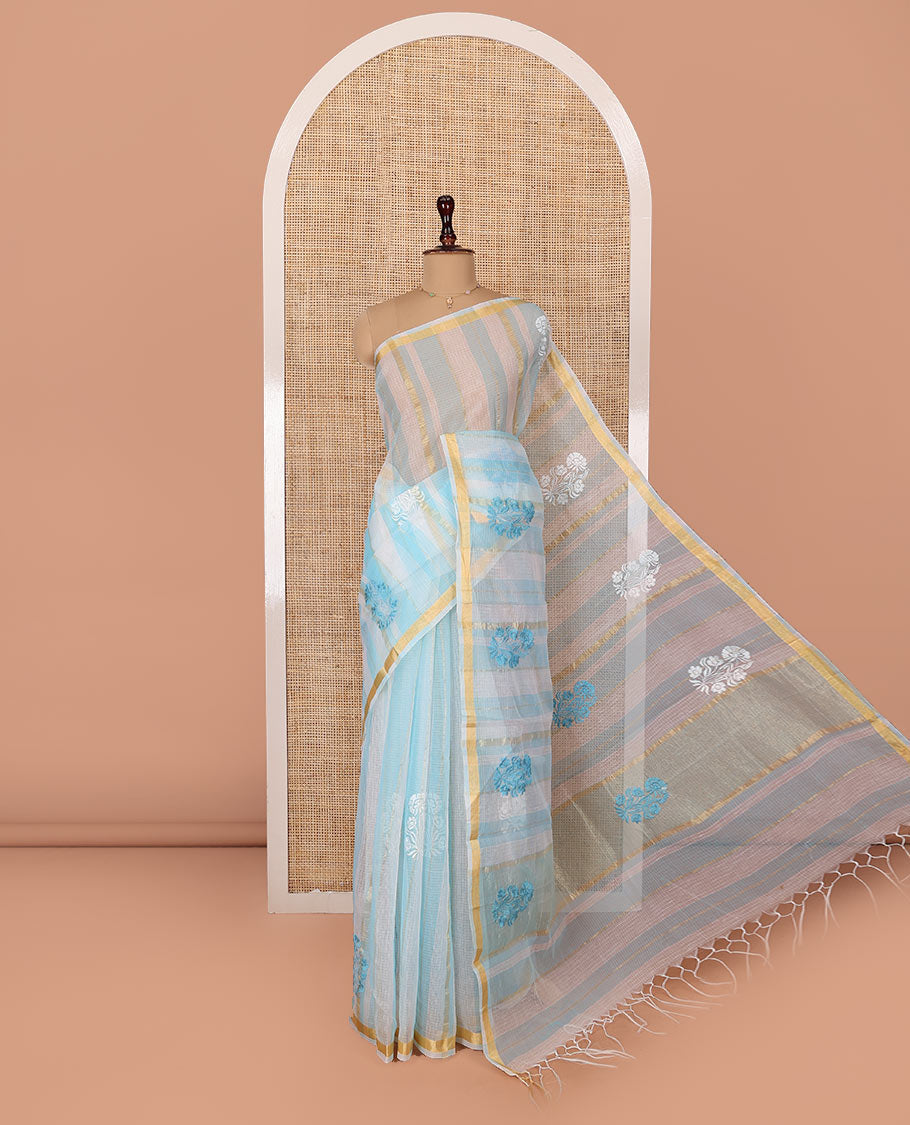 White and Blue Kota Cotton Saree, Mesmerized with Stripes and Floral Motifs Thread Embroidery on Its Body, Piping Border, Pallu Features Floral Embroidery, and Paired with a Matching Blouse