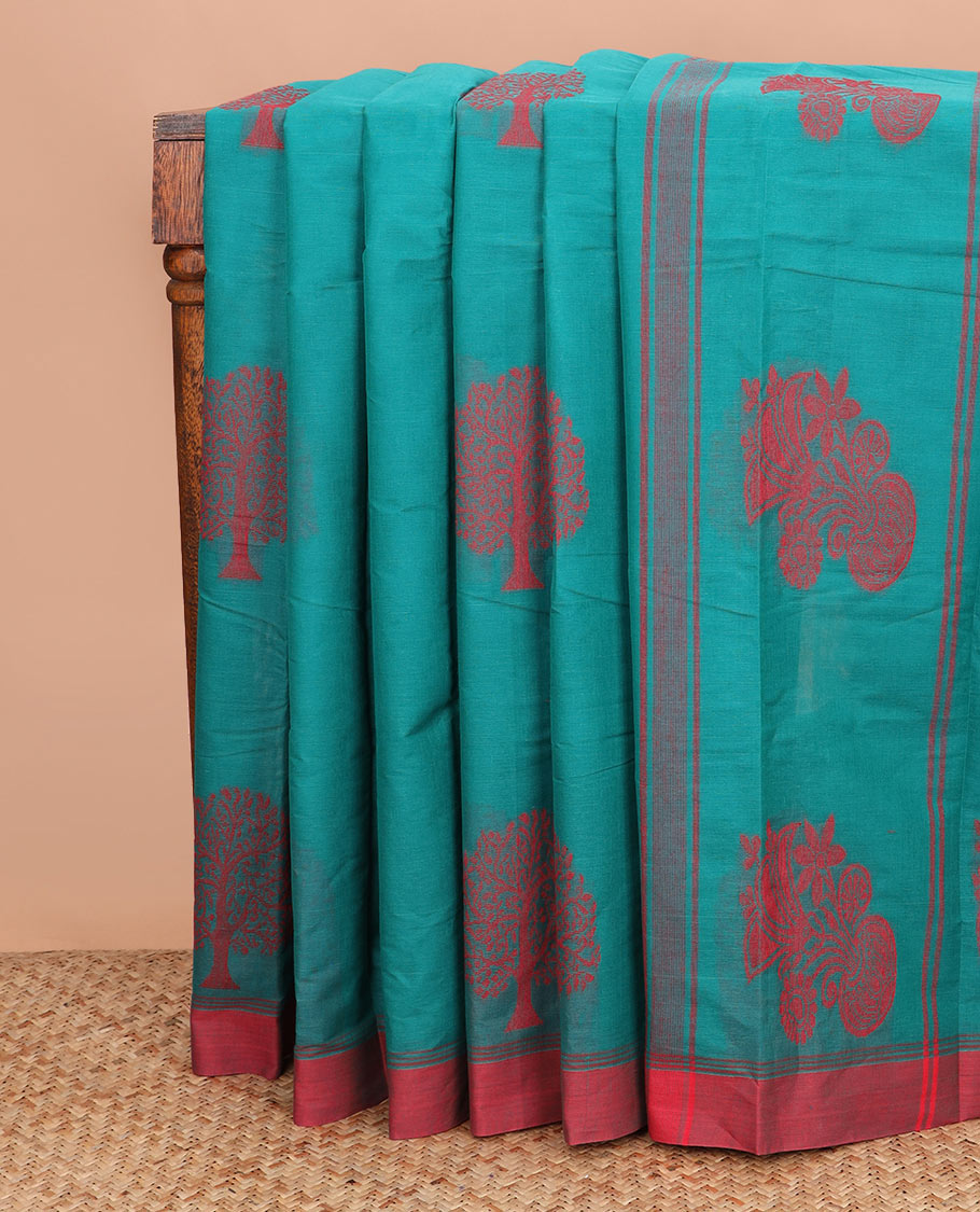 Green tree buttas kanchi cotton saree, contrast plain border, and floral potted pallu