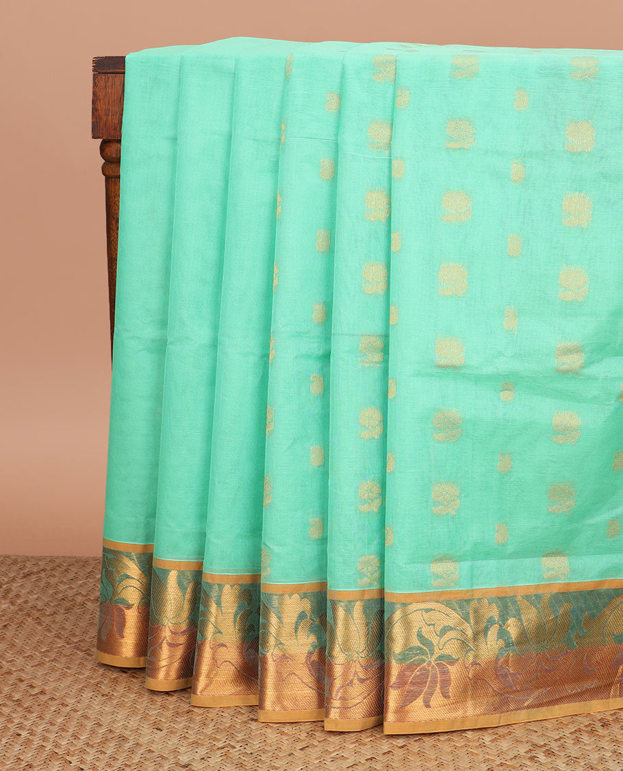 Turquoise zari buttas Venkatagiri cotton saree, contrast zari floral creeper border, and pallu of leaf designs