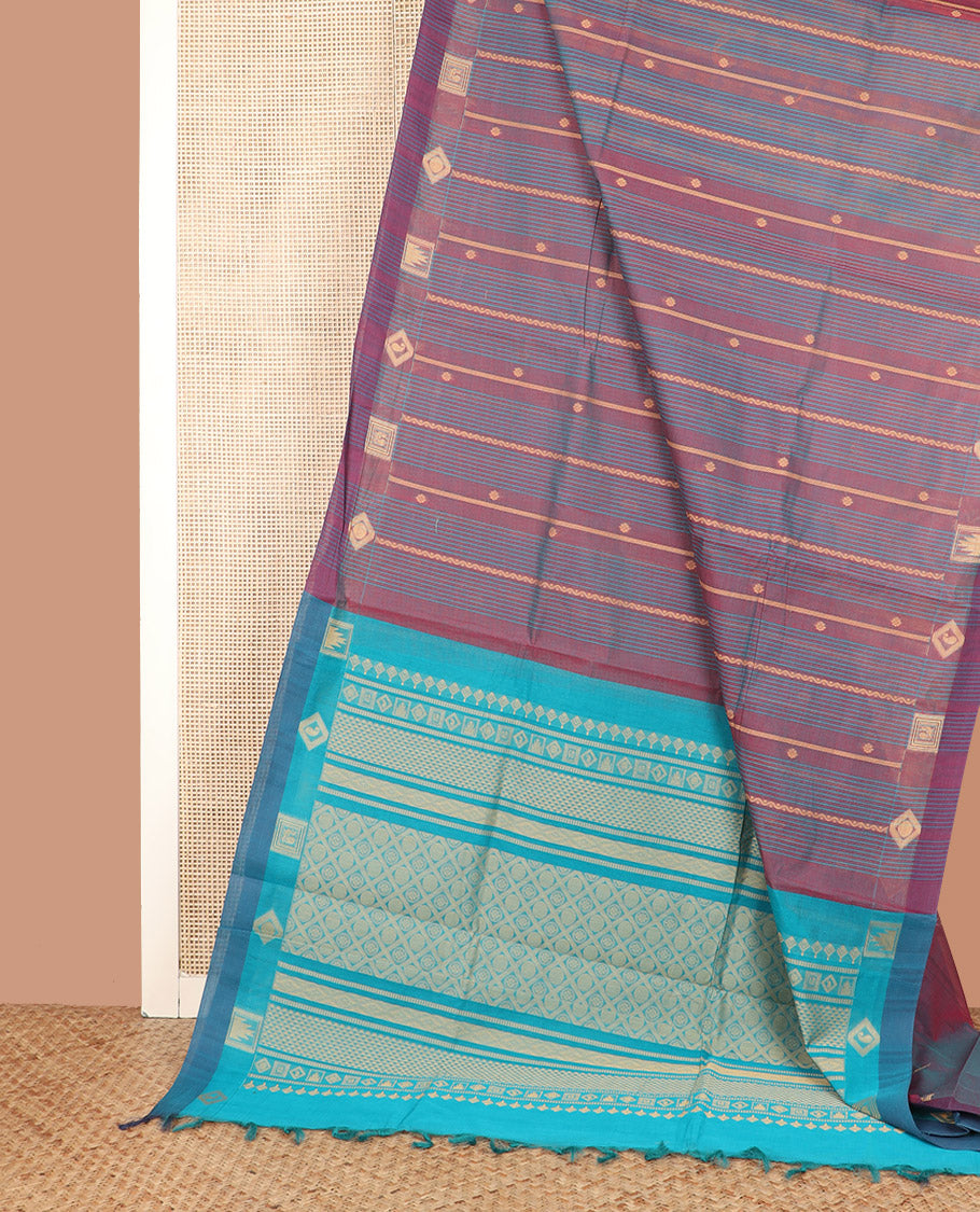 Purple Coimbatore Cotton Saree Enlivened with Traditional Designs All Over Its Body, Subtly Woven Border, Captivating Contrast Pallu of Jaal Designs, and Paired with a Contrast Blouse