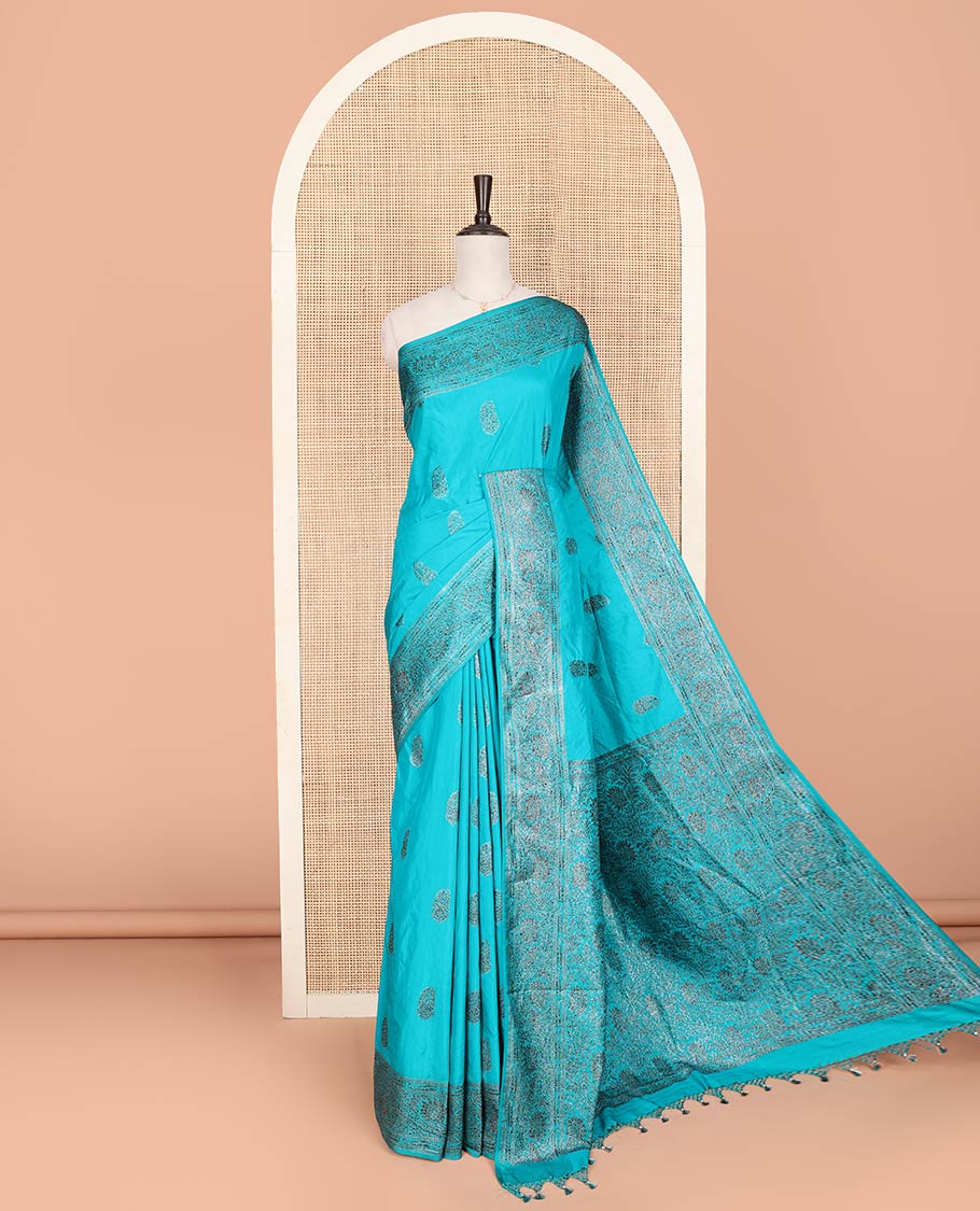 Blue Fancy Georgette Saree Woven with Zari Buttas, Hazily Zari Woven Border of Floral Creeper Designs, Zari Woven Pallu of Floral Jaal Designs, and Paired with a Matching Blouse