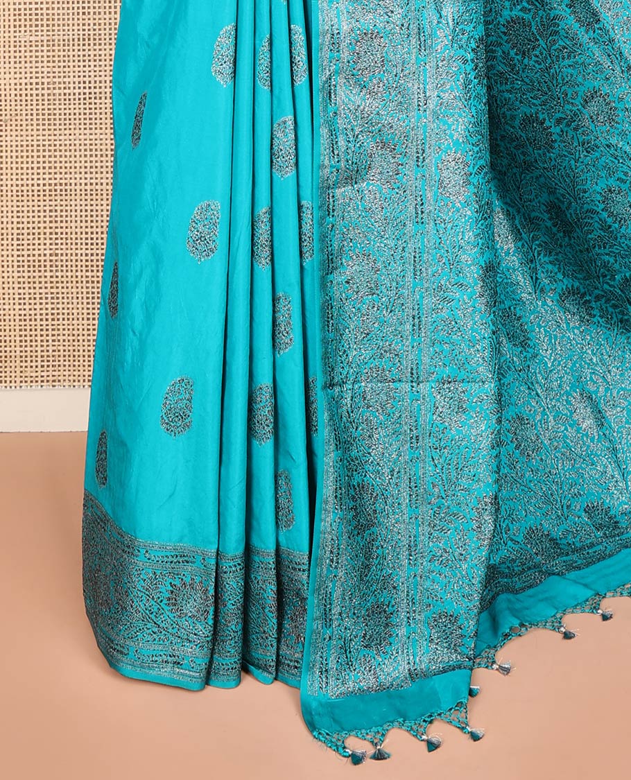 Blue Fancy Georgette Saree Woven with Zari Buttas, Hazily Zari Woven Border of Floral Creeper Designs, Zari Woven Pallu of Floral Jaal Designs, and Paired with a Matching Blouse