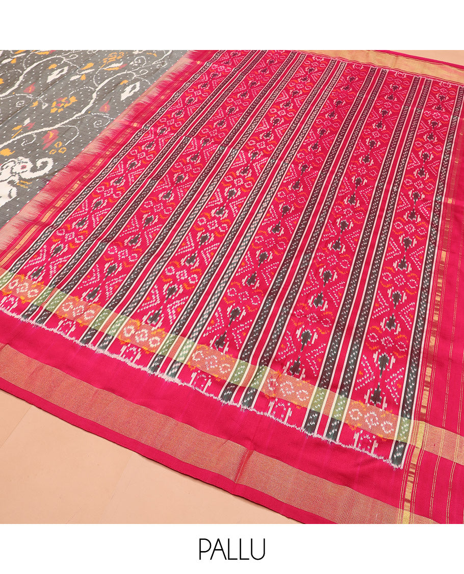 Grey Ikkat Silk Saree Decked Up with Elephant Motifs in Ikkat Weave, Complemented by a Contrast Temple Border, Pallu Woven in Intricate Ikkat Designs, and a Contrast Blouse