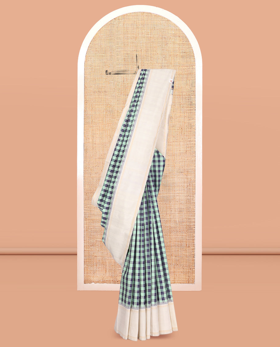 Green-Blue Checked Kanchipuram Silk Saree, Complemented by a Contrast Thazampoo Rekku Bodi Border, Sparsely Woven Pallu, and Contrast Blouse