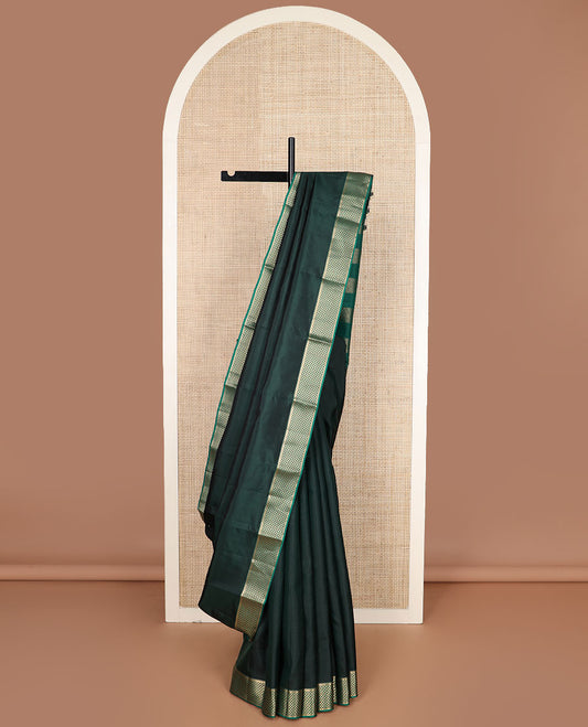 Deep forest green plain Kanchipuram silk saree, contrast border of rekku & ara maadam design & pallu of ara maadam designs