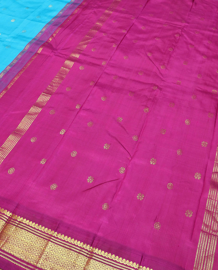 Blue zari buttas Kanchipuram silk saree, contrast korvai border of thilakam mokku, banaras, and jaal designs, and zari design pallu