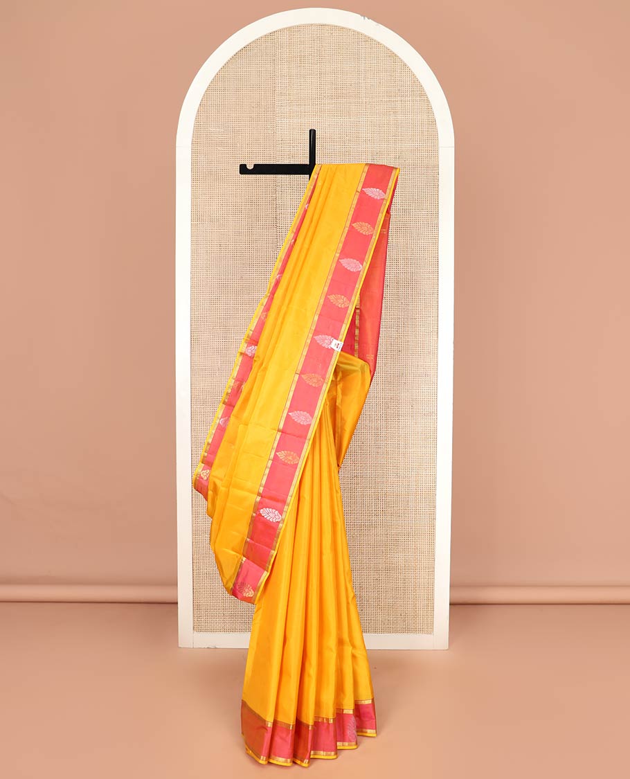Yellow Plain Kanchipuram Silk Saree, Complemented by a Captivating Contrast Border of Zari Designs, Zari Designs Woven Pallu, and Paired with a Contrast Blouse