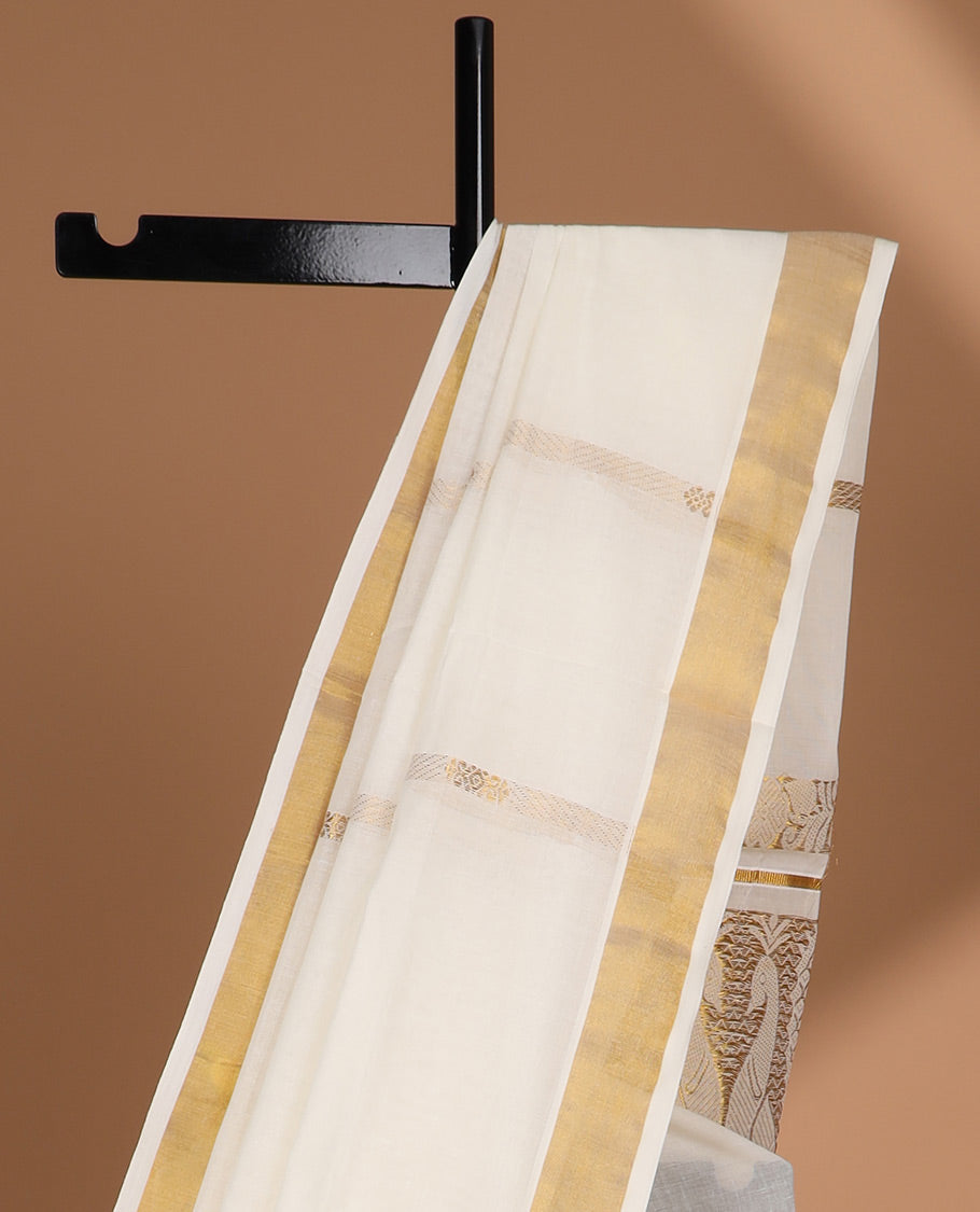Cream kerala saree with zari stripes, plain border & pallu of floral & peacock designs