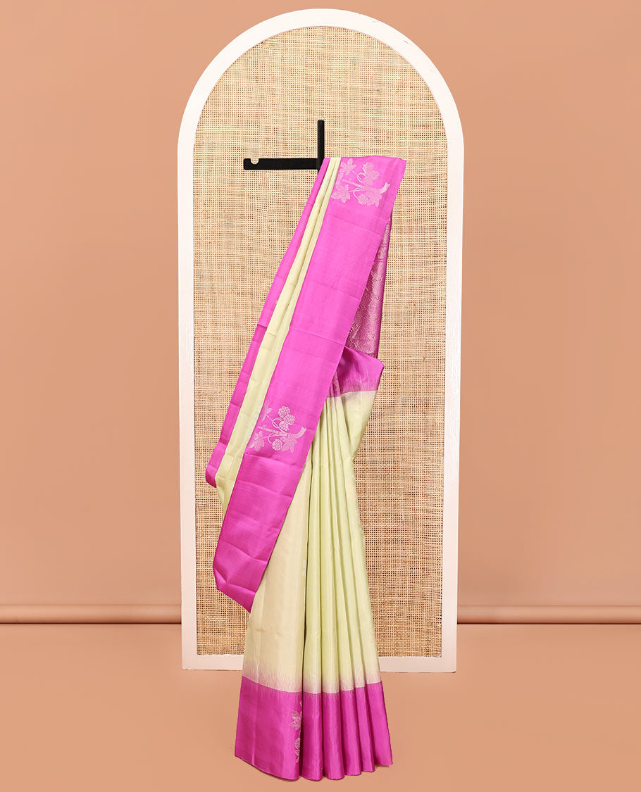 Pale Yellow Mayuri Soft Silk Saree, Finely Crafted with Floral Zari Buttas All Over Its Body, Complemented by Contrast Border of Floral Designs, Intricately Designed Pallu, and Paired with a Contrast Blouse
