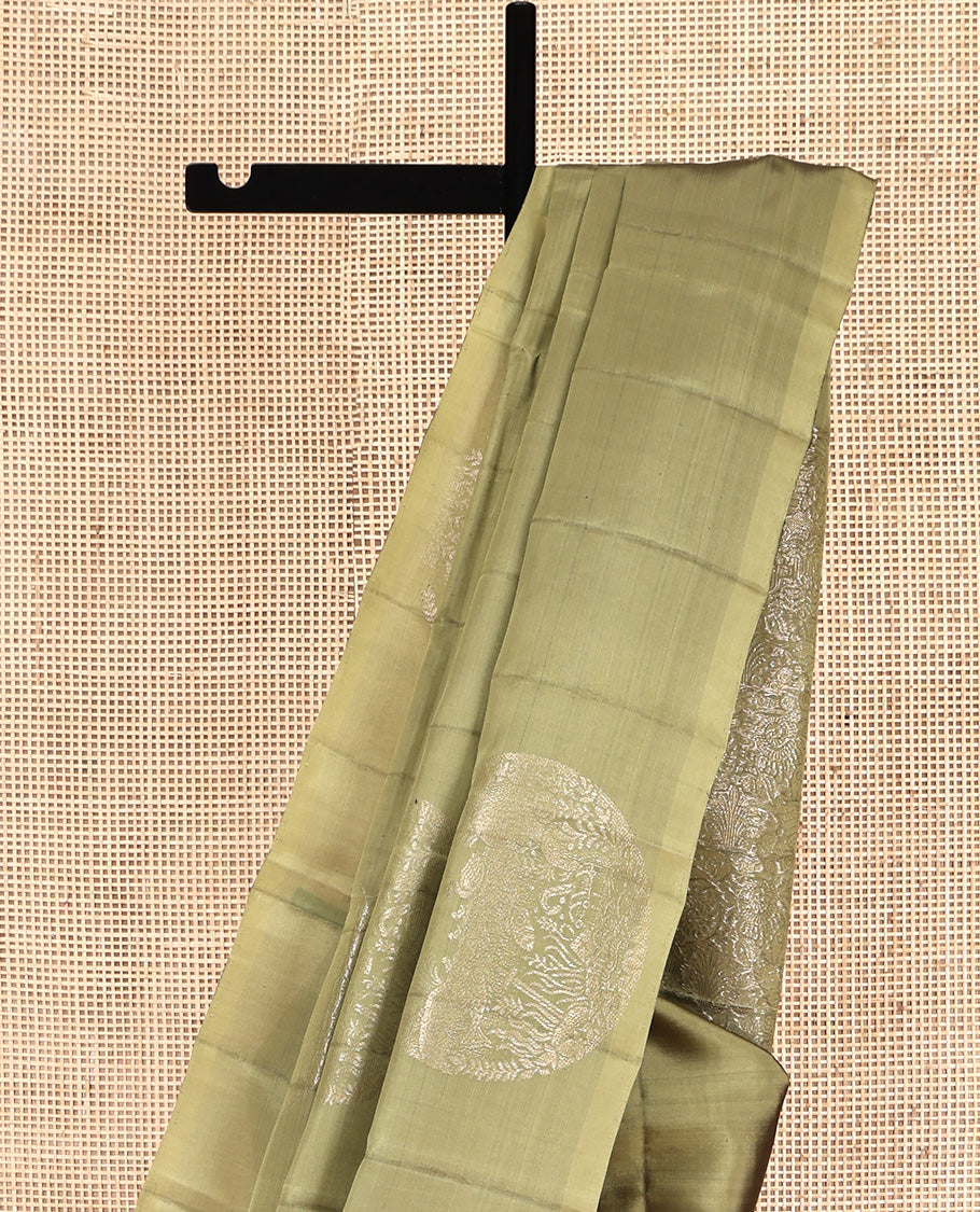 Borderless Pale Green Mayuri Lite Silk Mix Saree, Uniquely Detailed with Round Buttas All Over Its Body, Highlighted by a Self-Pallu of Sea-Themed Designs, and Paired with a Matching Blouse