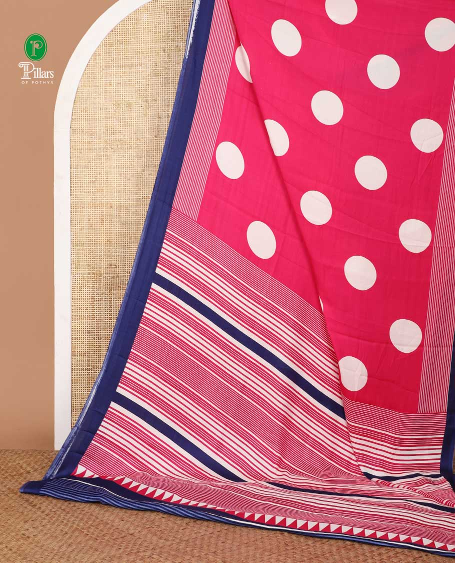 Cream with pink polka dot printed gajji silk saree with contrast piping border & printed pallu along with striped printed blouse