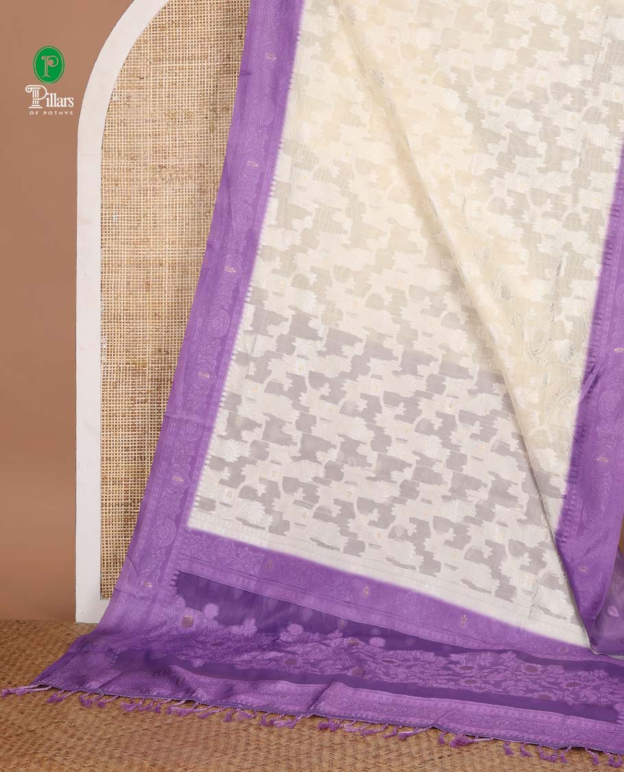 Cream with violet thread weaving, zari butta banaras brasso saree with contrast thread border & thread weaving pallu along with butta design blouse