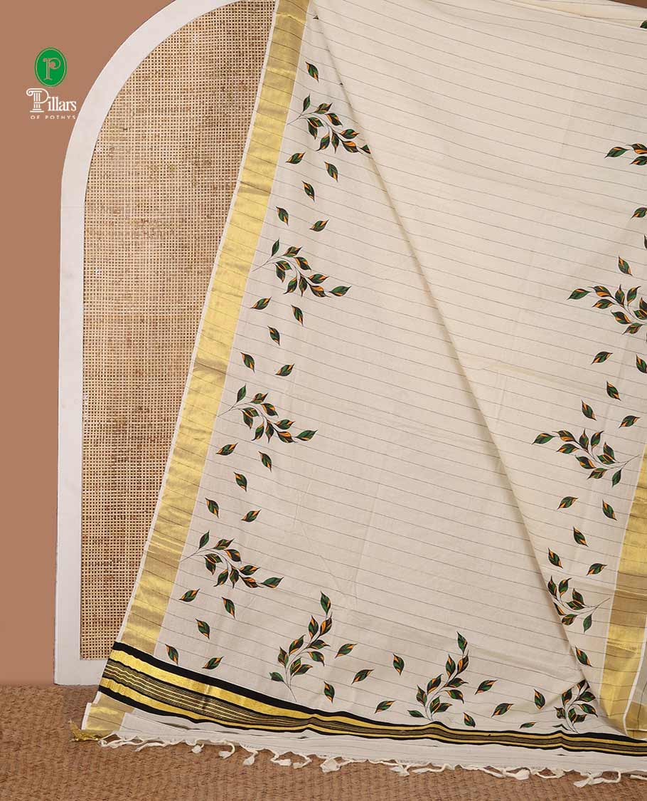 Cream & black Kerala cotton saree with stripes & leaf motifs screen print, golden zari border & screen printed pallu