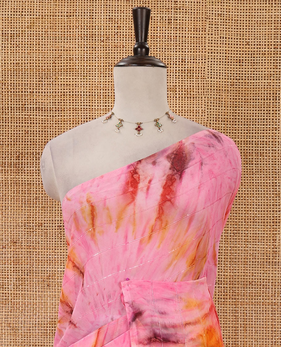 Borderless pink shibori-style printed & sequins work marble chiffon saree, self-pallu with tassels & contrast embroidered blouse